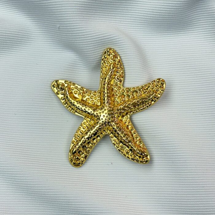 Accesorios Zamak estrella 7cm